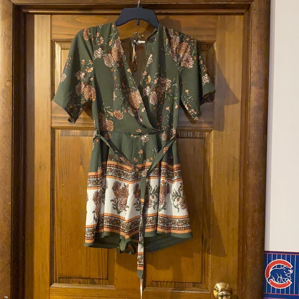 Francesca’s romper. New with tags